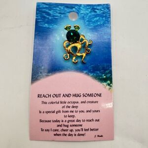 Gold Octopus Brooch with Green Gem